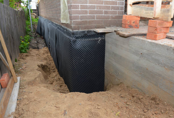 Happy homeowners after waterproofing job in Mount Clemens